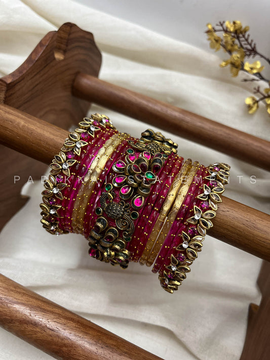 Peacock Prabhavam Gold Lotus Bangle Set – Rani Pink and Gold | Padikkai