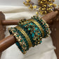 Peacock Prabhavam Gold Lotus Bangle Set – Peacock green and Gold | Padikkai