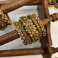 Suvarna Pushpam Gold Bridal Bangle Set – Pearl Gold and Glass Gold | Padikkai