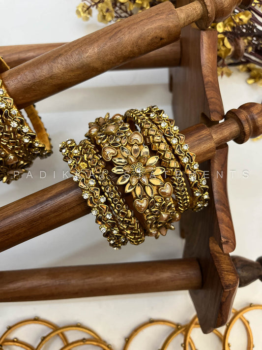 Suvarna Pushpam Gold Bridal Bangle Set – Pearl Gold and Glass Gold | Padikkai