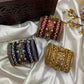 Suvarna Pushpam Bridal Bangle Set – Red and Gold | Padikkai