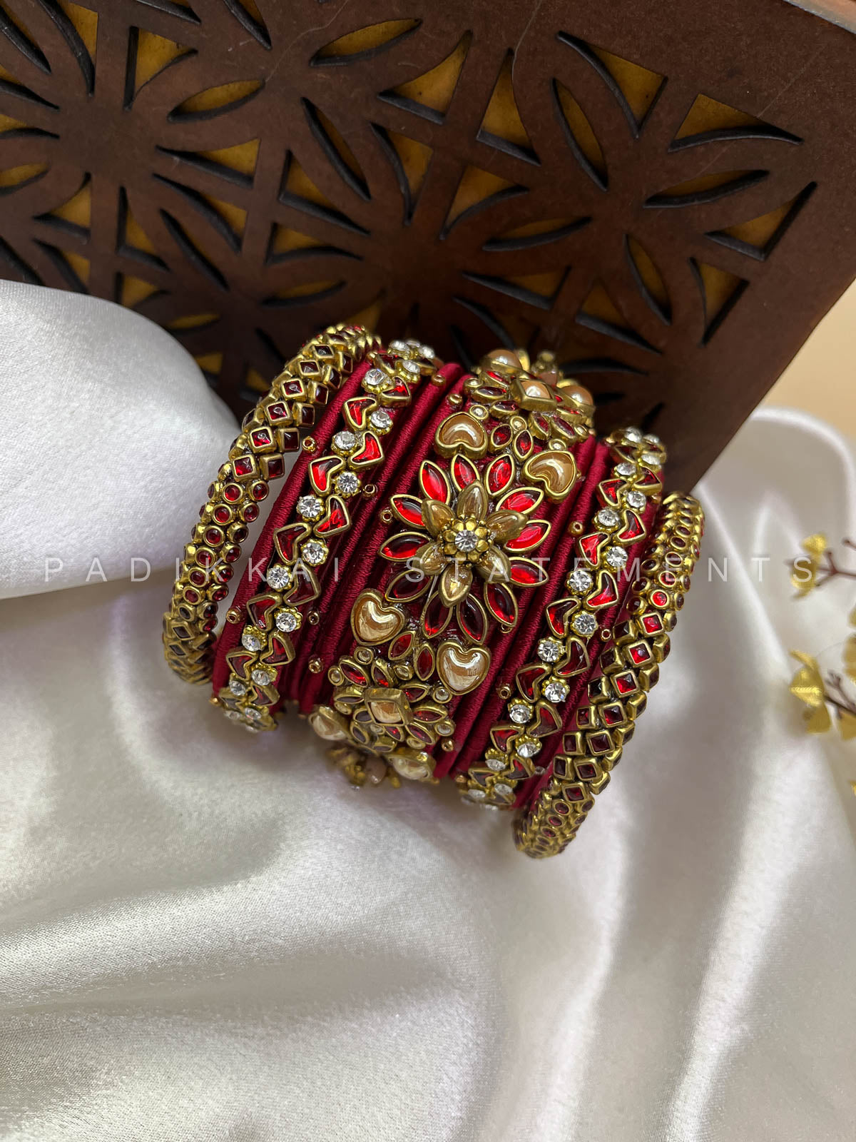 Suvarna Pushpam Bridal Bangle Set – Red and Gold | Padikkai