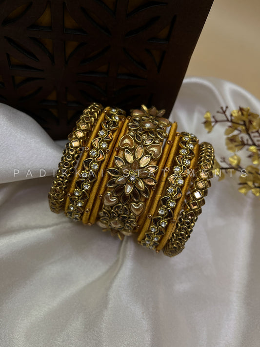 Suvarna Pushpam Gold Bridal Bangle Set – Pearl Gold and Glass Gold | Padikkai