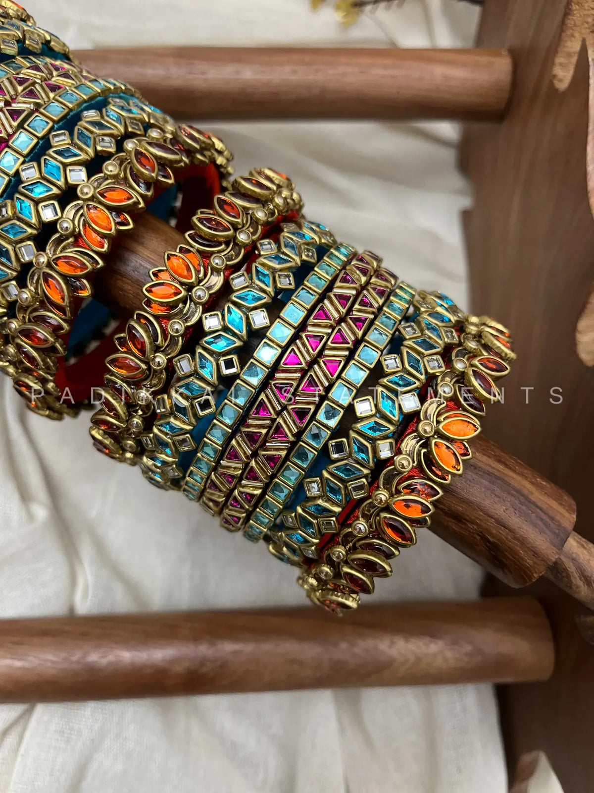 Thamarai Varnika Festive Kundan Bangle Set – Sea Blue, Magenta Pink, Orange & Antique Gold