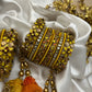 Aarohi Malar Festive Kundan Bangle Set – Saffron Yellow, Orange & Antique Gold