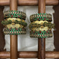 Shree Valli Kundan Bridal Set – Emerald Green, Maroon and Pearl Gold