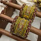 Radha Krishna Sandhya Kundan Bangle Set – Maroon, Mustard Yellow & Antique Gold